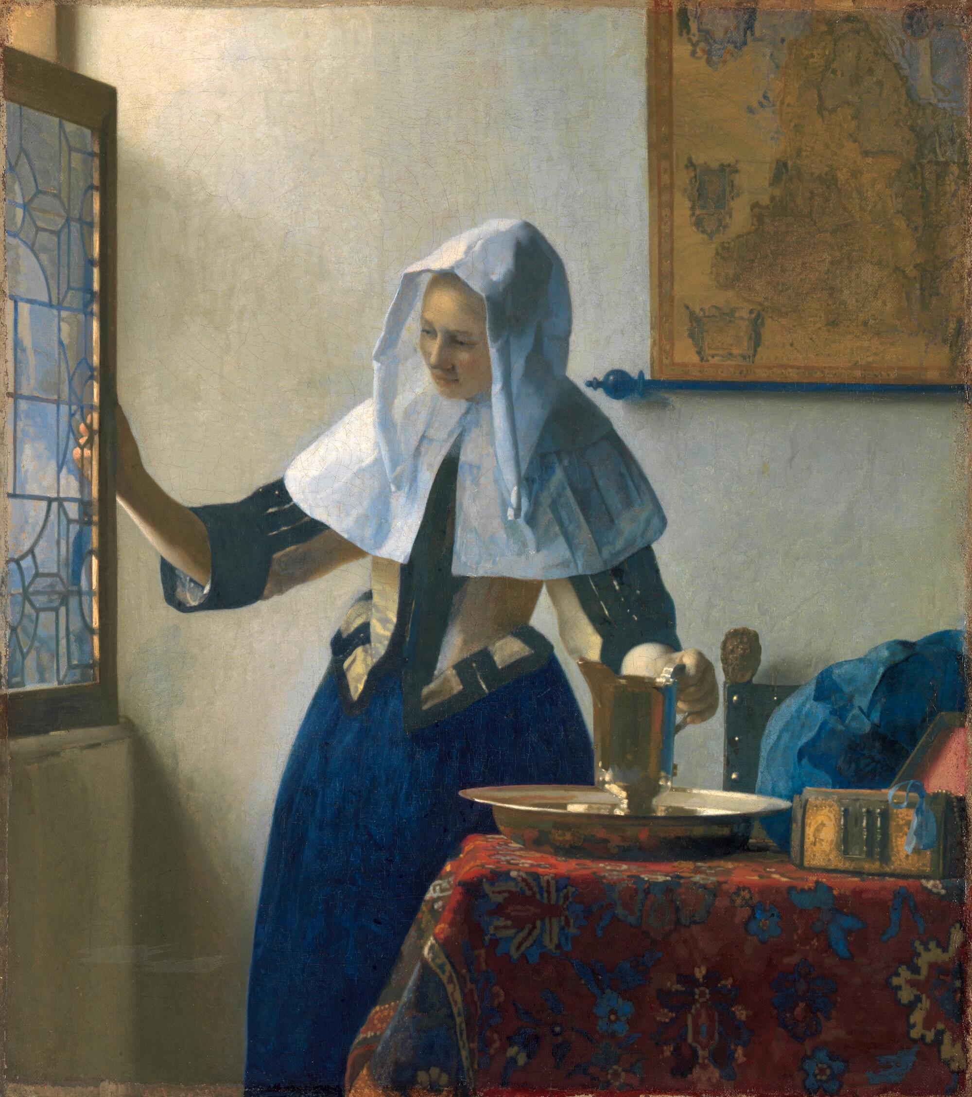 Jeune femme &agrave; l&rsquo;aigui&egrave;re de Johannes Vermeer
